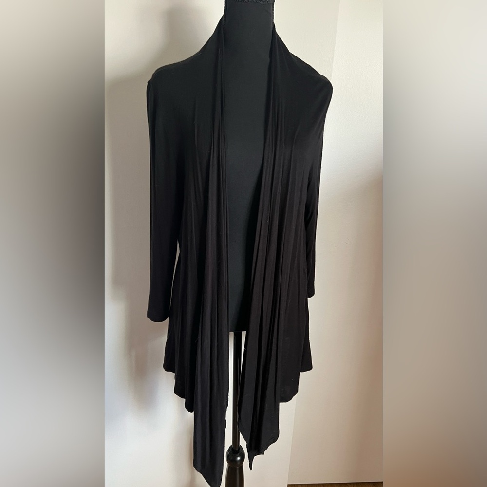 Long black cardigan handkerchief hem.